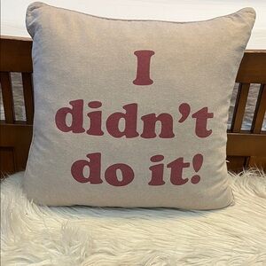 Beige Pillow with Red Text